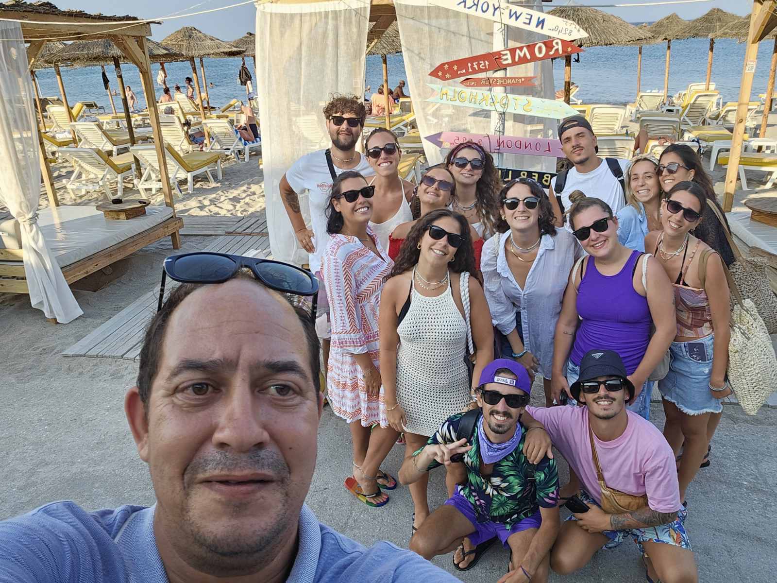 Antonis with happy tourists in front of his Mercedes Sprinter on Kos